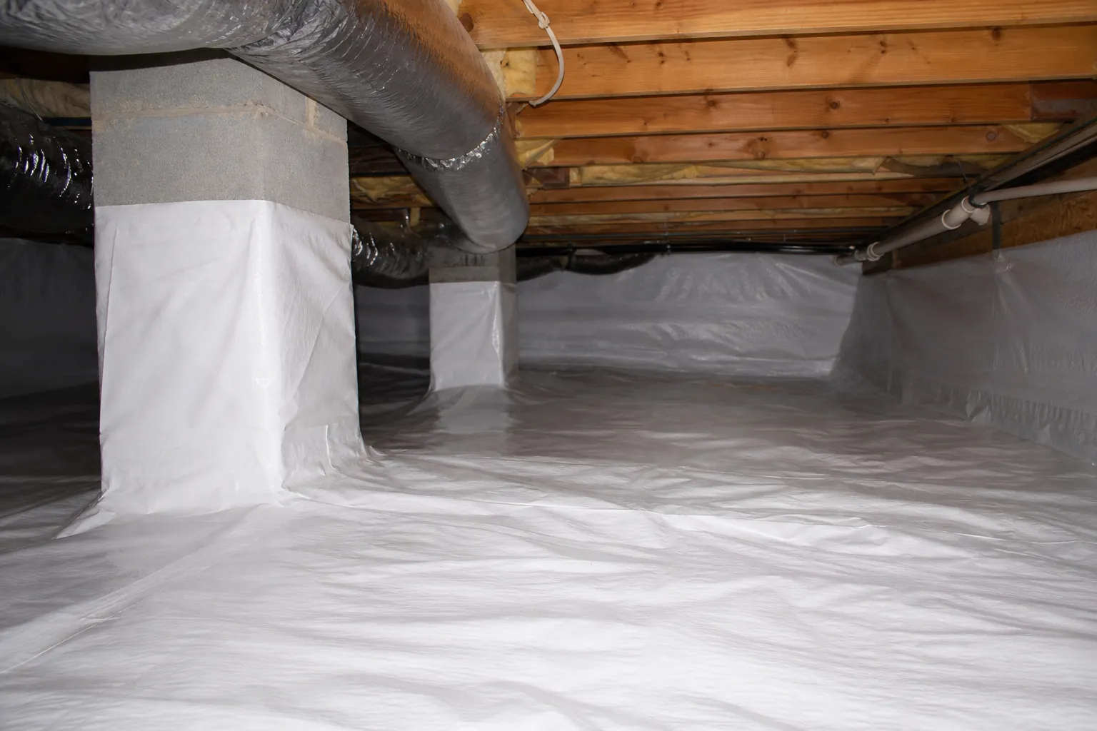 Editorial illustration of What does crawl space encapsulation cost in Greensboro? in North Carolina