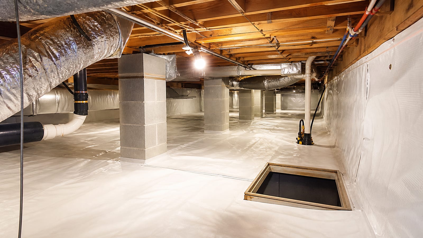 Crawl space moisture control inspection beneath a multifamily property