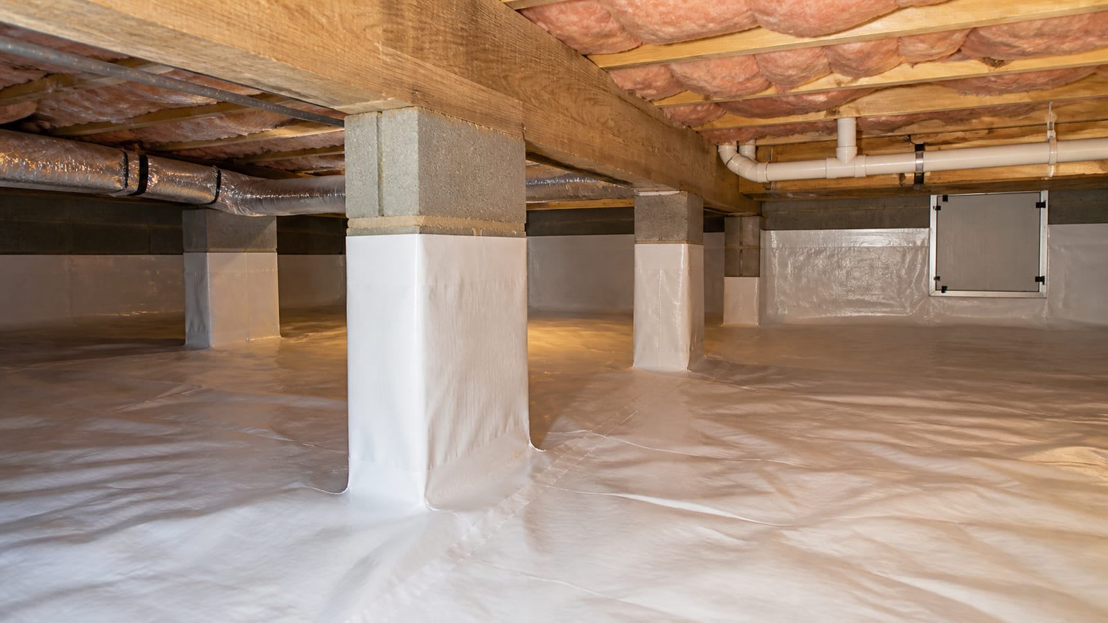 Crawl space vapor barrier installation beneath a Raleigh home
